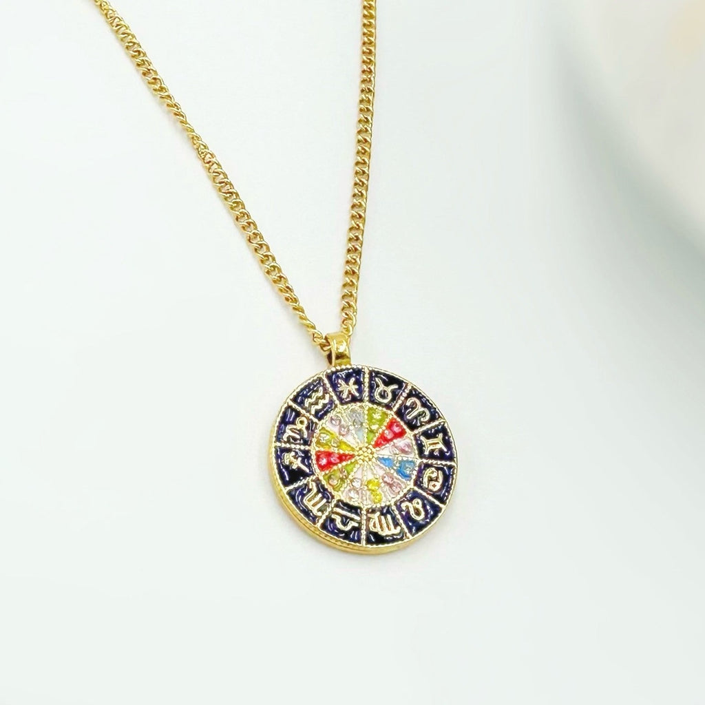 flatlay of zodiac necklace 