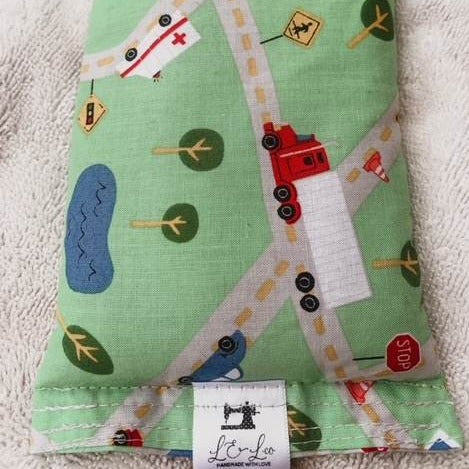 Children's soothing bag with Lavender Scents in On The Road Again by L&L Co., laid on a flat white surface. 