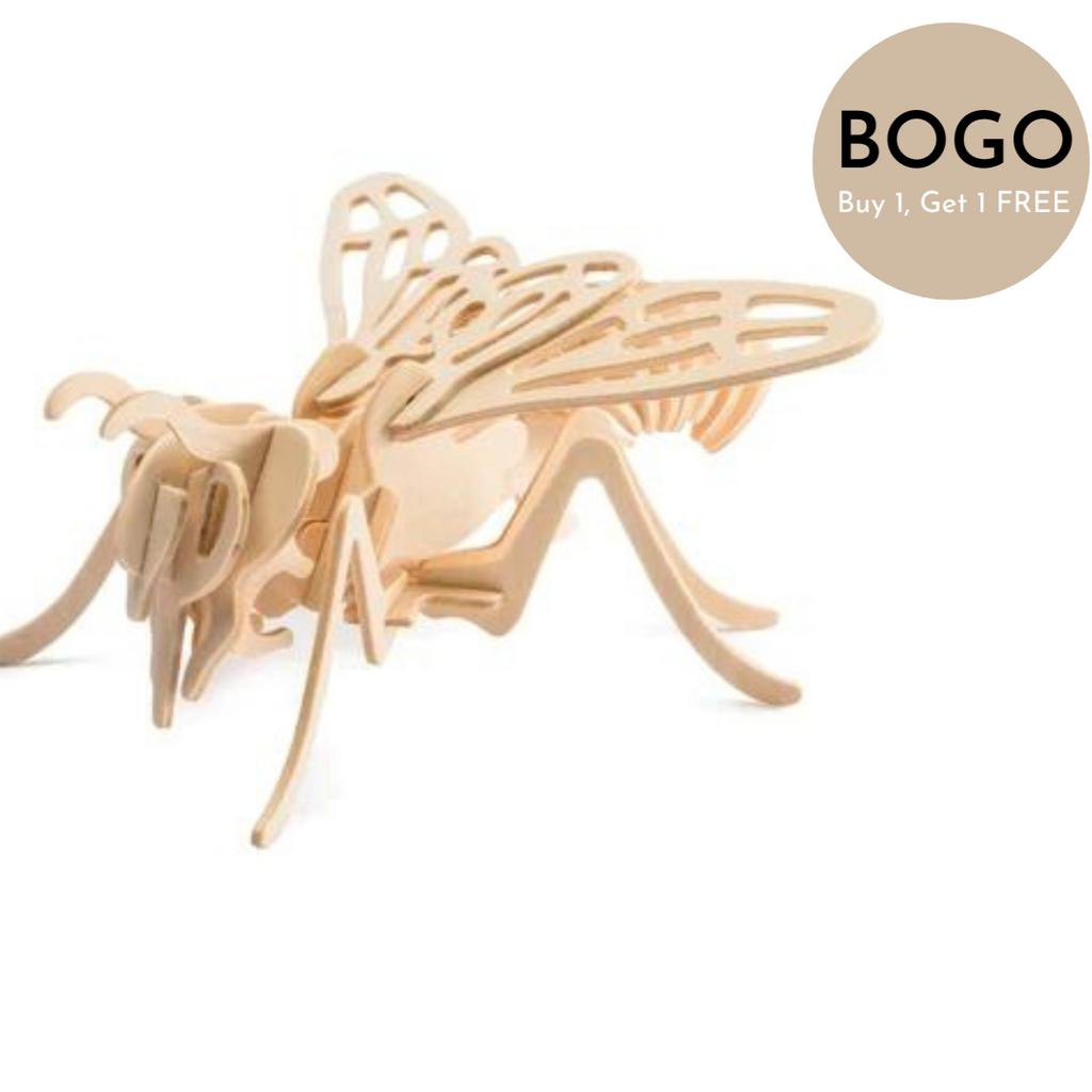 White background with a built 3D Wooden Puzzle of a Bee by Hands Craft. Beige circle in top right corner with BOGO in black and Buy 1, Get 1 FREE in white. 
