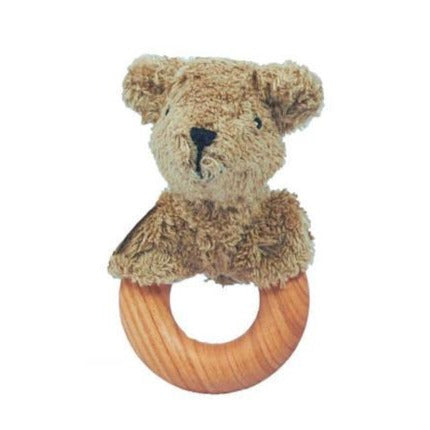 White background with the Animal Rattle in Bear by Senger Naturwelt. Rattle has a wooden circular handle, with a stuffed bear head attached.