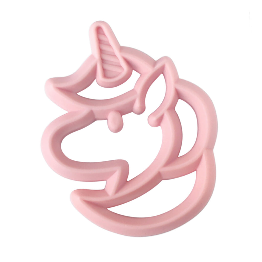 White background with Chew Crew Silicone Baby Teether in Unicorn by Itzy Ritzy. Teether is a very light pink and shaped like a unicorn.