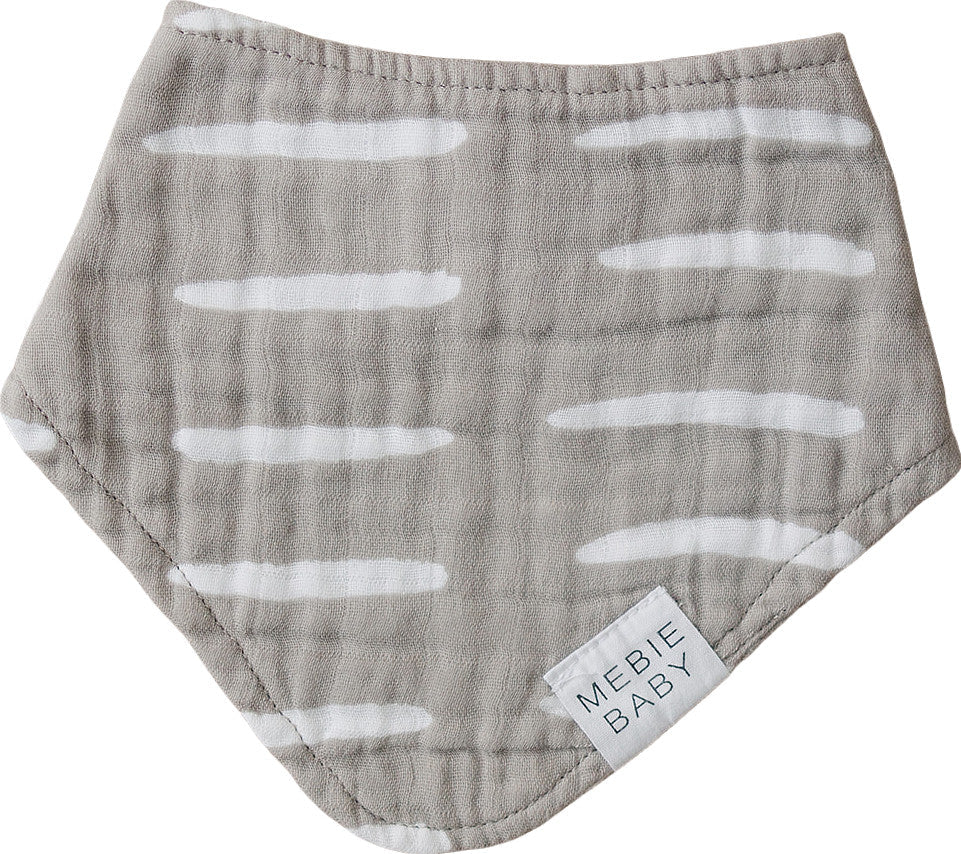 Grey Dash Bib by Mebie Baby, in a greyish purple colour, with white dashes that are going horizontal, with a white backdrop. 