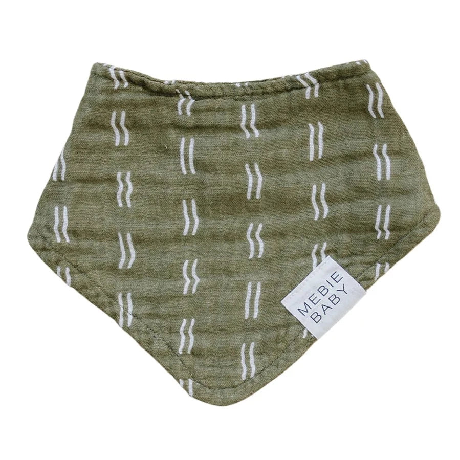 White background with Olive Strokes Bib by Mebie Baby. Bib is a triangle bib, in an olive colour, with white squiggly lines and a white tag on the left side that says "Mebie Baby".