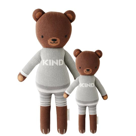 White background with Oliver The Bear by Cuddle and Kind, both sizes side by side.