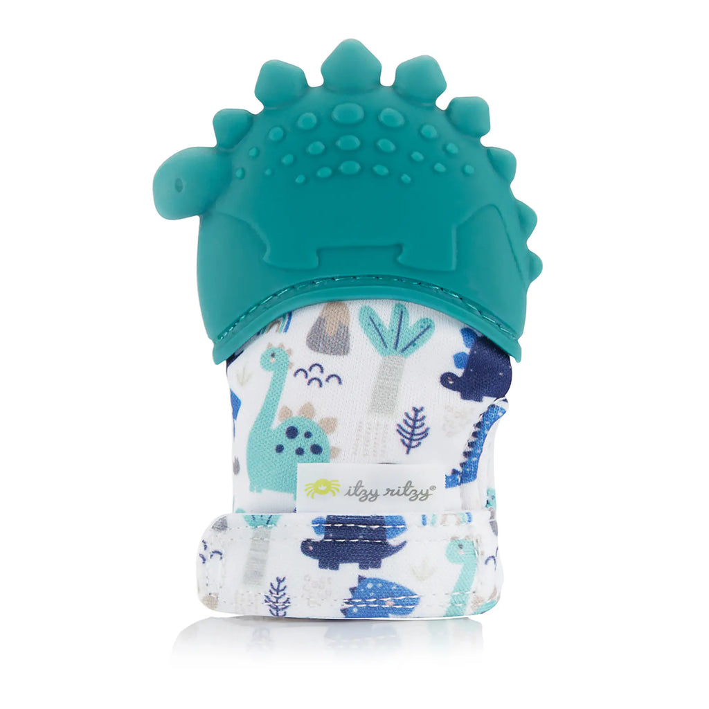 White background with the Itzy Mitt™ Silicone Teething Mitt in Dinosaur by Itzy RItzy. This mitt has a teal silicone dinosaur on the top, and the base is a crinkly material in white, with a blue dino pattern all over.
