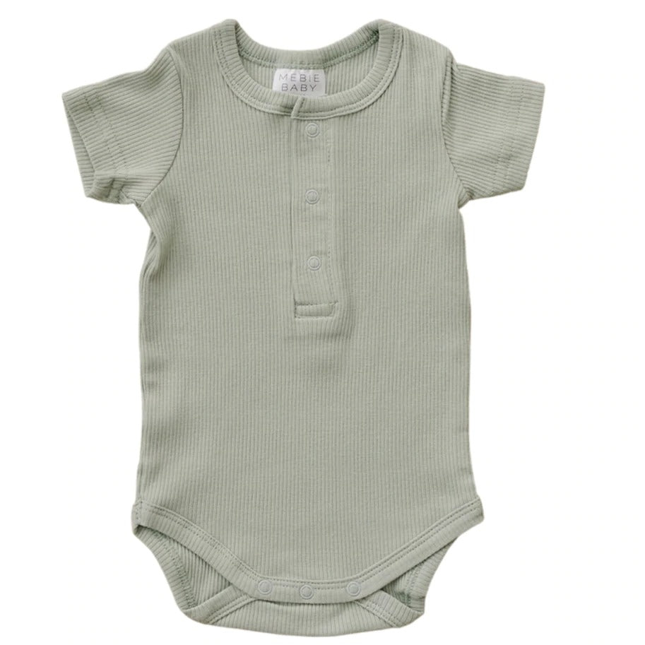 White background with Sage Organic Cotton Ribbed Snap Bodysuit by Mebie Baby. Bodysuit is ribbed sage, with 3 buttons down the front.
