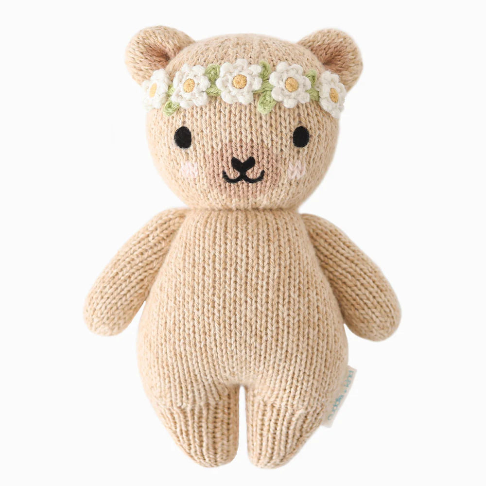 pink bear with floral head band