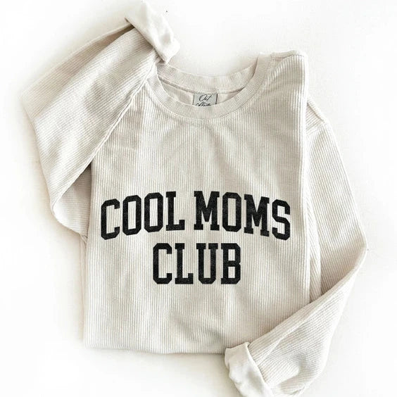 cool moms club flatlay on white 