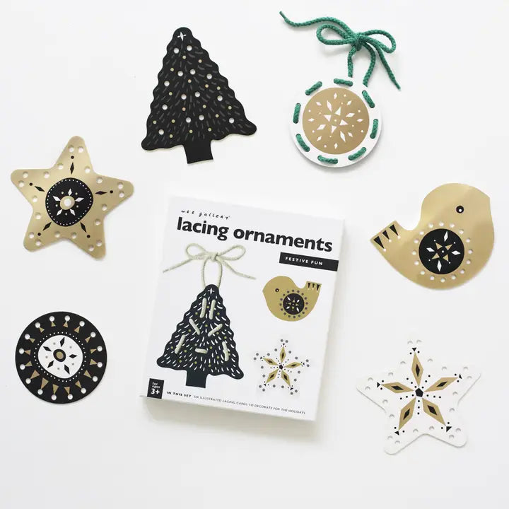 flatlay of lacing ornaments on white background 