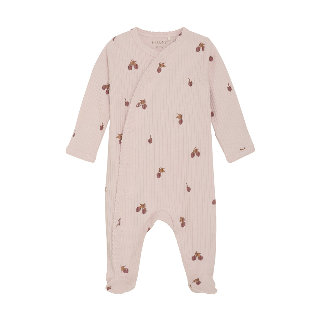 pink rib sleeper with snaps and acorns flat lay