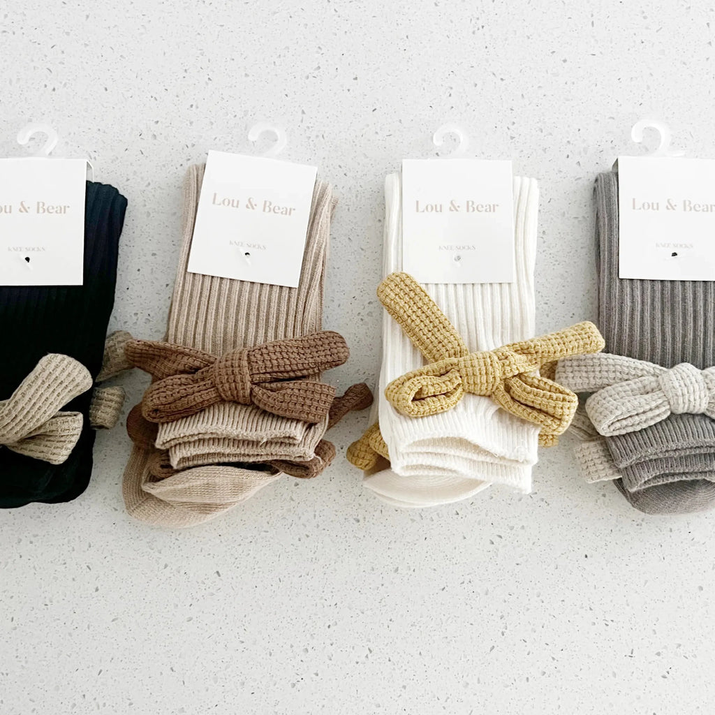 four pairs of socks flat lay