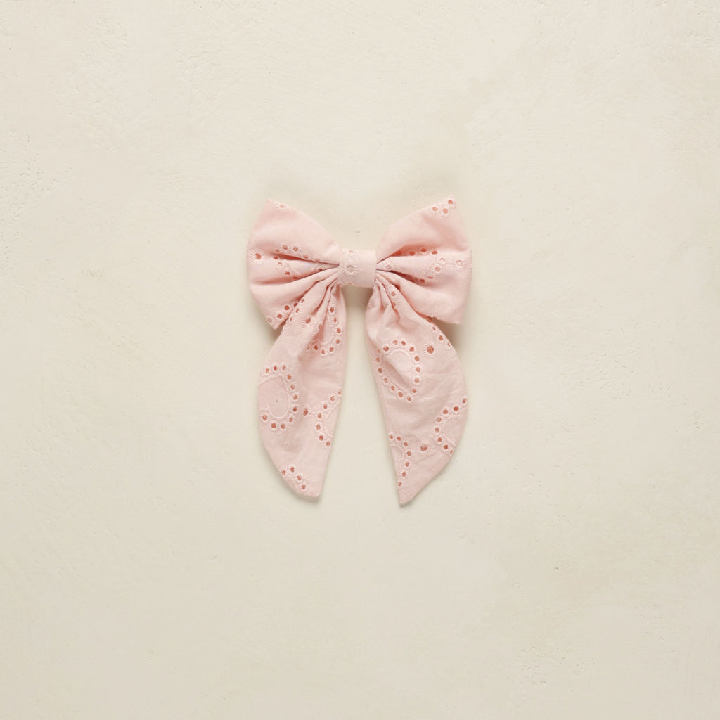 everly bow in blush on white background 