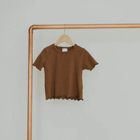 brown lettuce hem tee on gold rack 