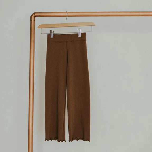 lettuce hem pant on gold rack white background 