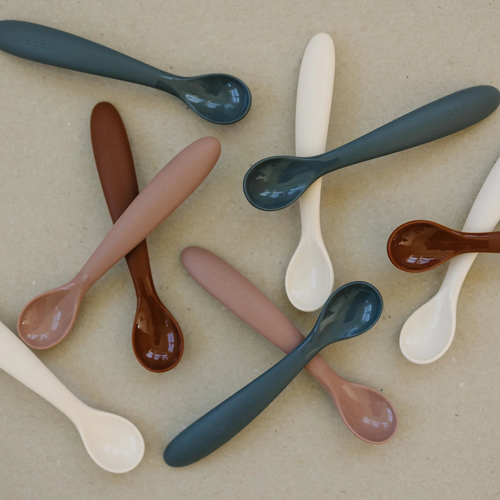 spoons flatlay on beige background 