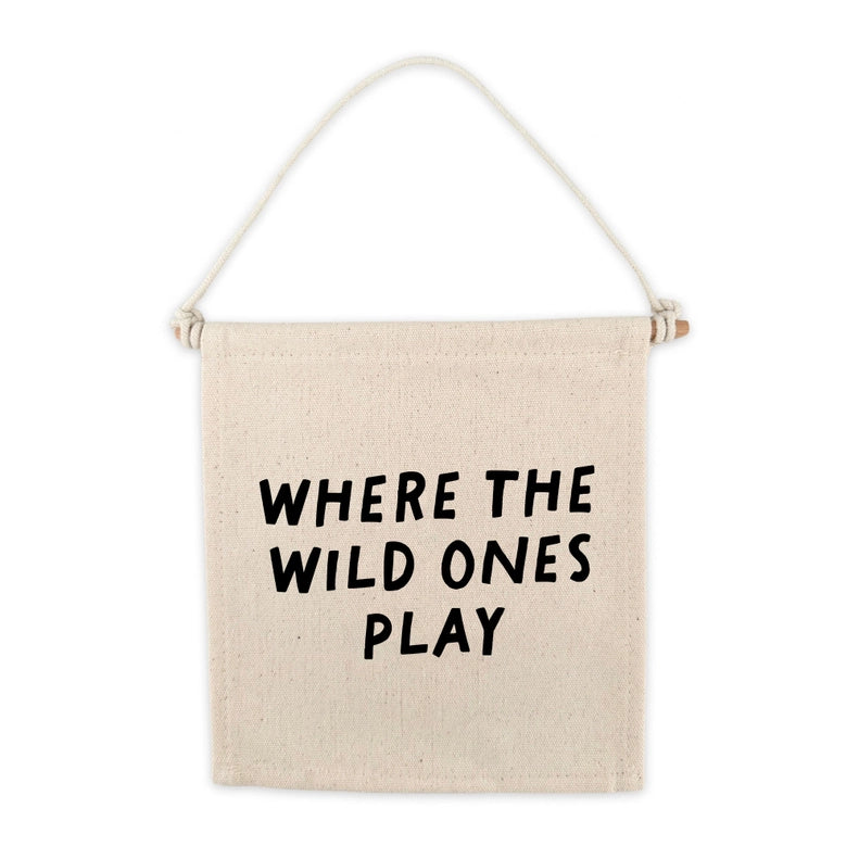 where the wild ones play flatlay on white background 