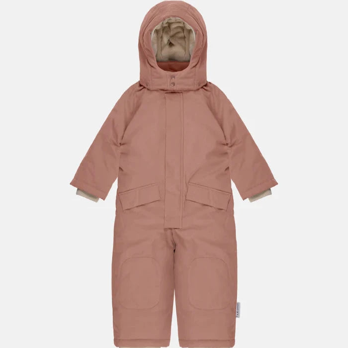 rose dawn snowsuit flatlay on white background 