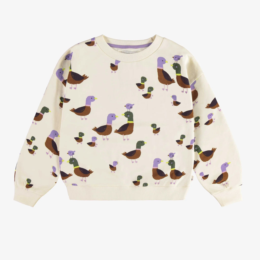 flatlay of duck sweater on white background 