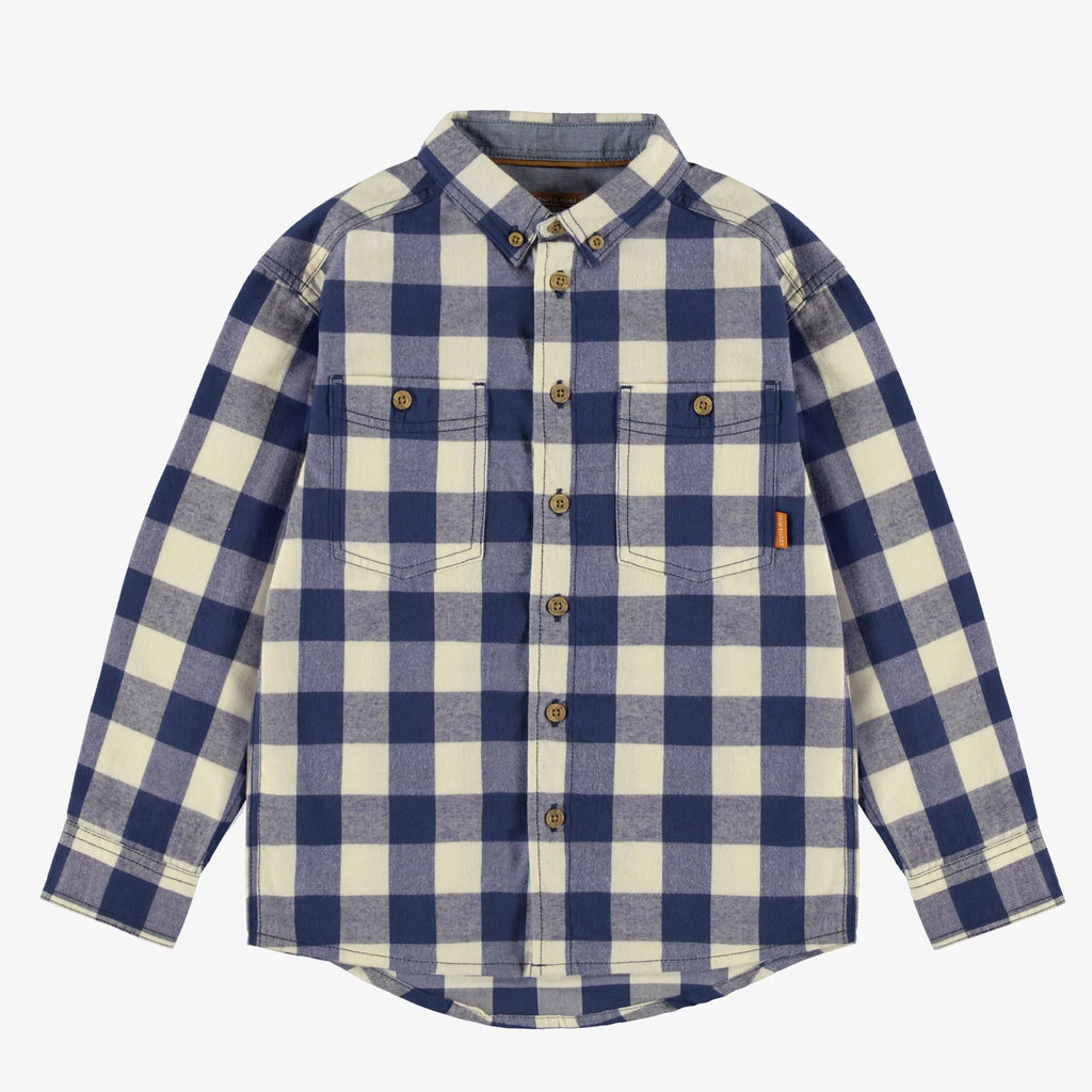 flatlay of plaid flannel blue shirt on white background