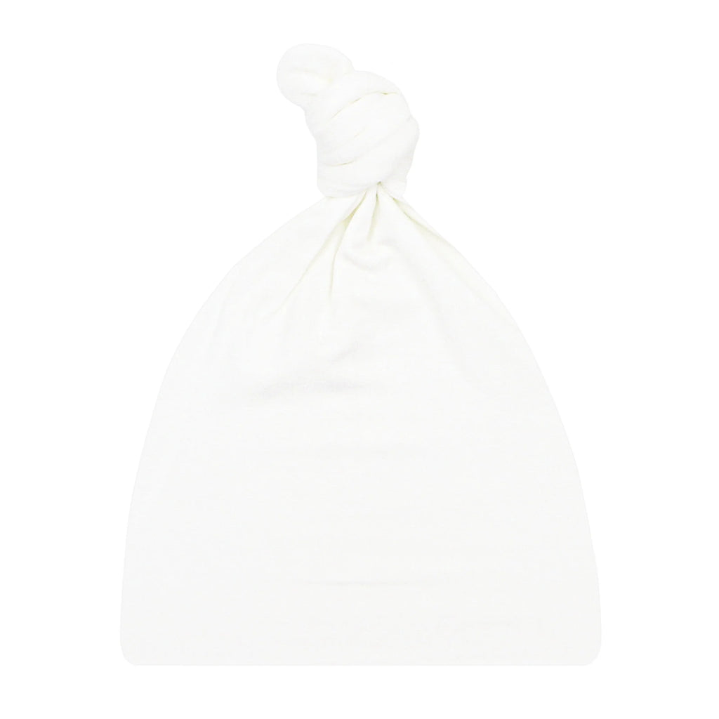 flatlay of finley hat on white background 