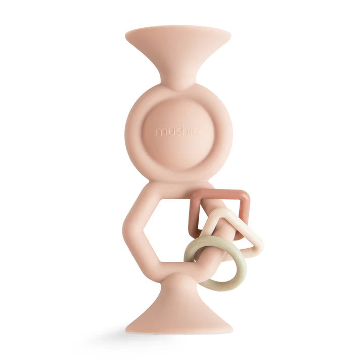 suction toy in blush on white background