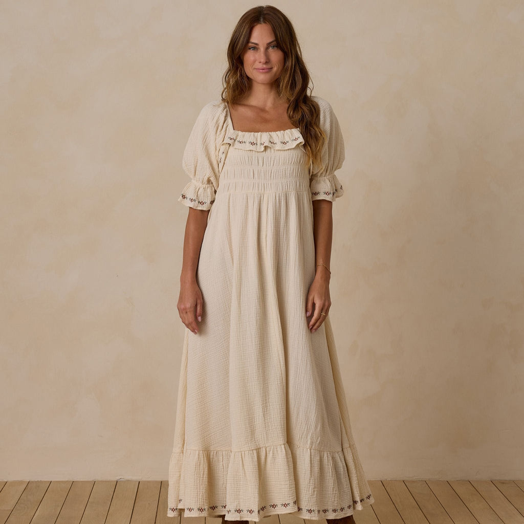 natural maxi dress with floral embroidery on women 