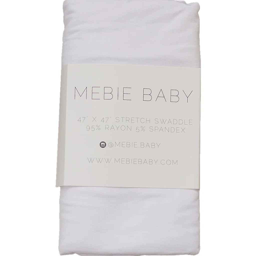 stretch white swaddle flatlay with packaging 