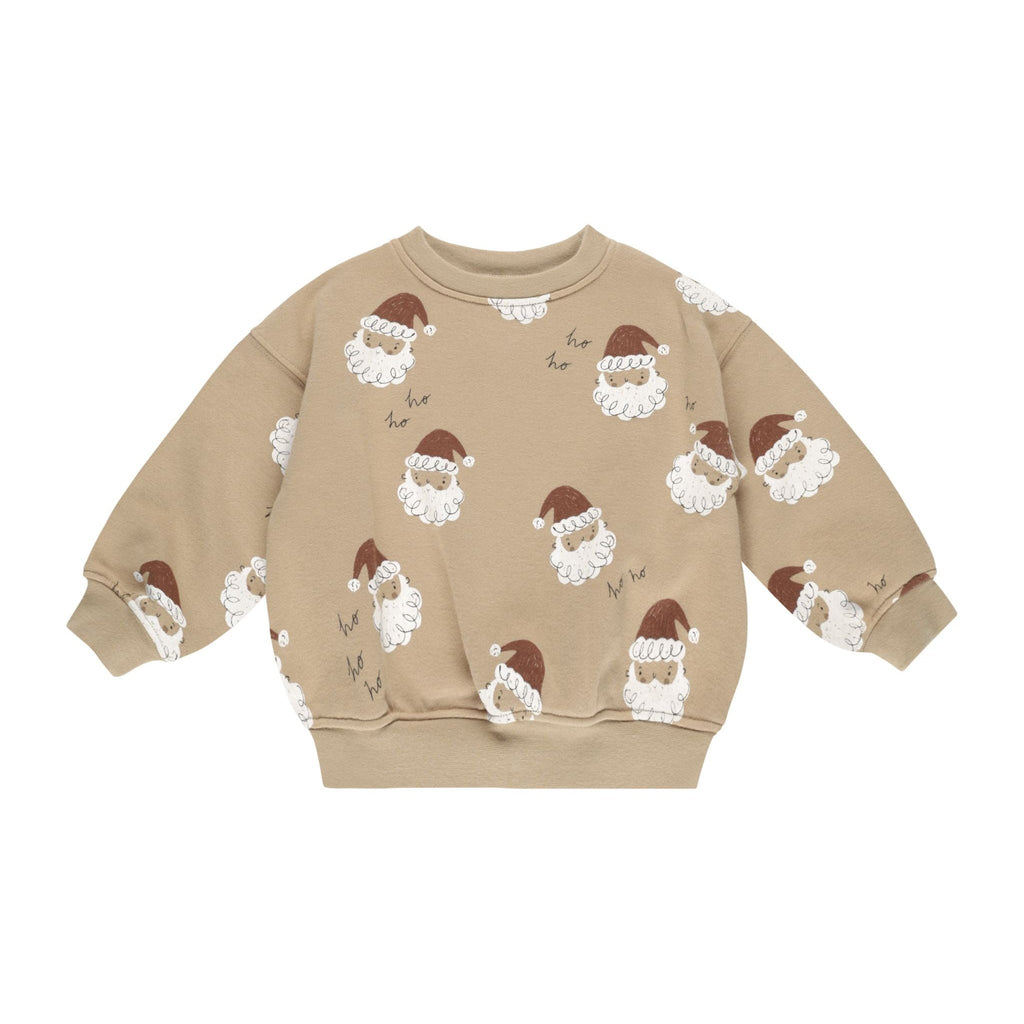 flatlay of sweater in santa print white background 