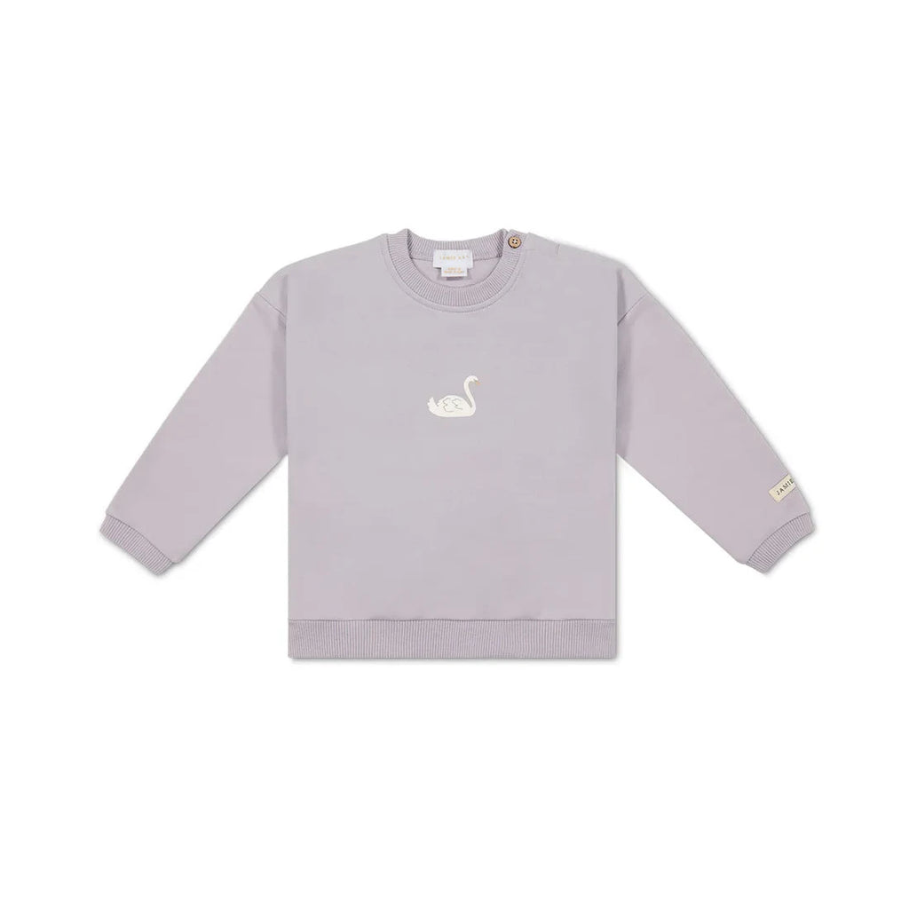 flatlay of purple swan sweater white background 