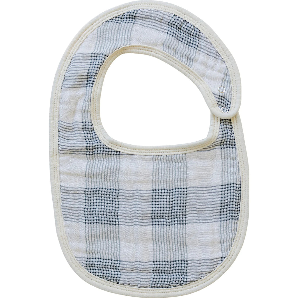 flatlay white background of plaid bib 