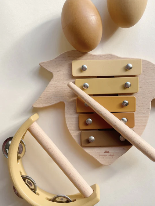 Musical Set | LEMON by Konges Slojd close up of lemon xylophone with egg shakers and tambourine wooden music set