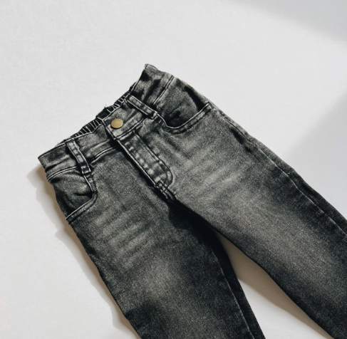 Faded Black Denim Pants | Orcas Lucille flat lay birdseye view of the denim jeans