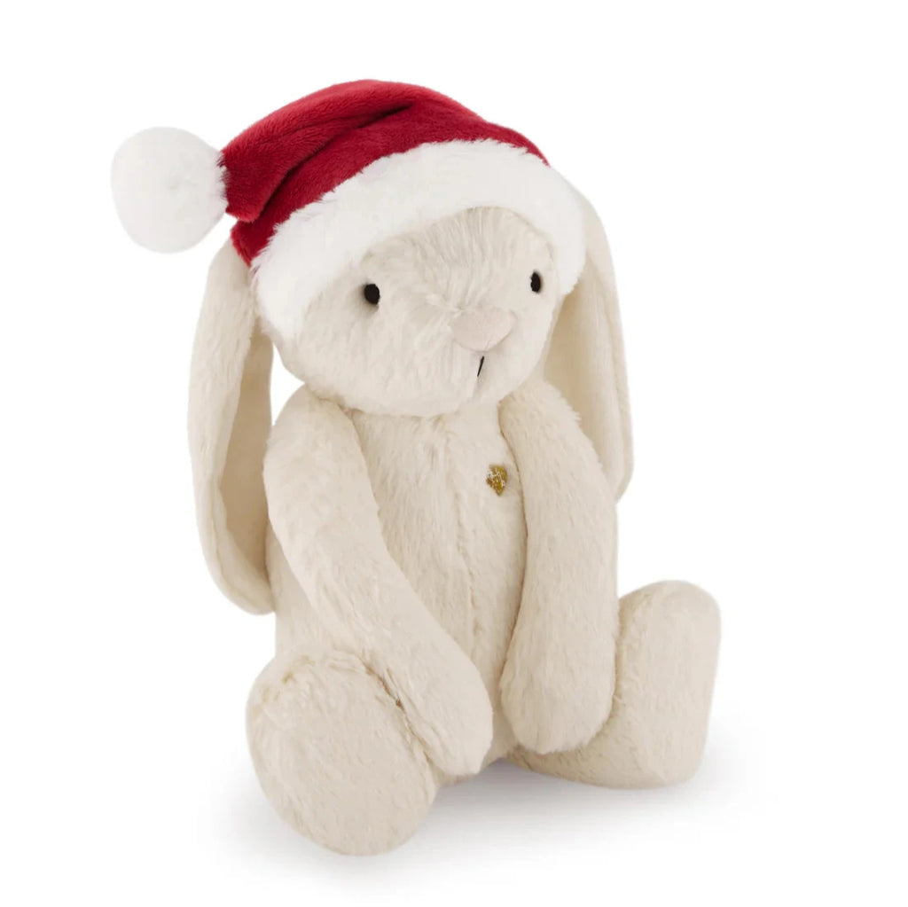 bunny with santa hat flatlay white background 