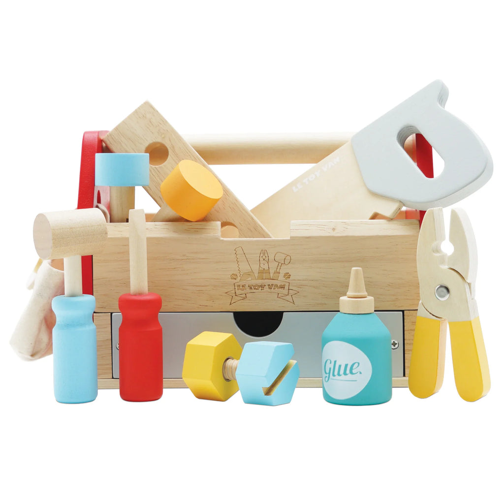 tool box latlay of wood toys white background 