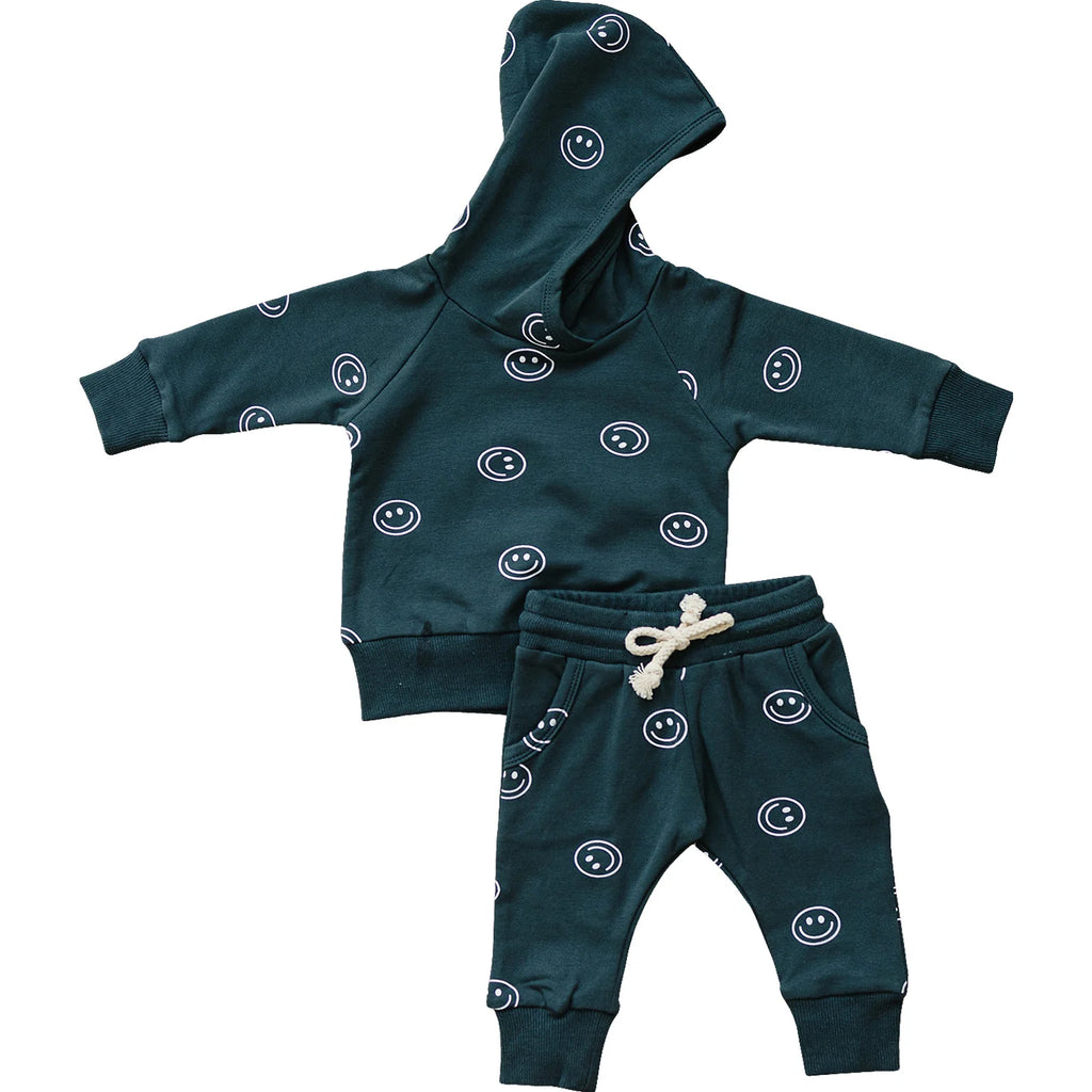 flatlay of two piece smile hooded set 