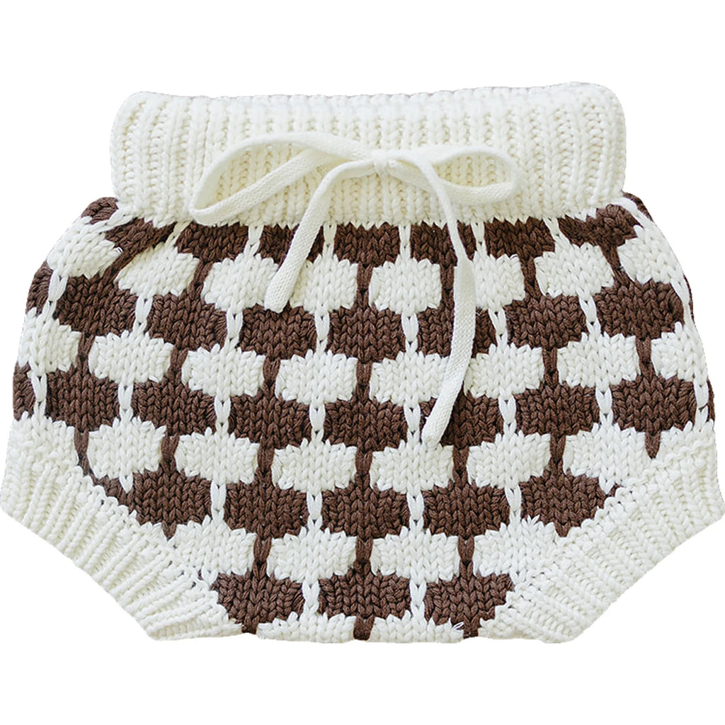 flatlay of knit bloomers in checkered brown on white background 