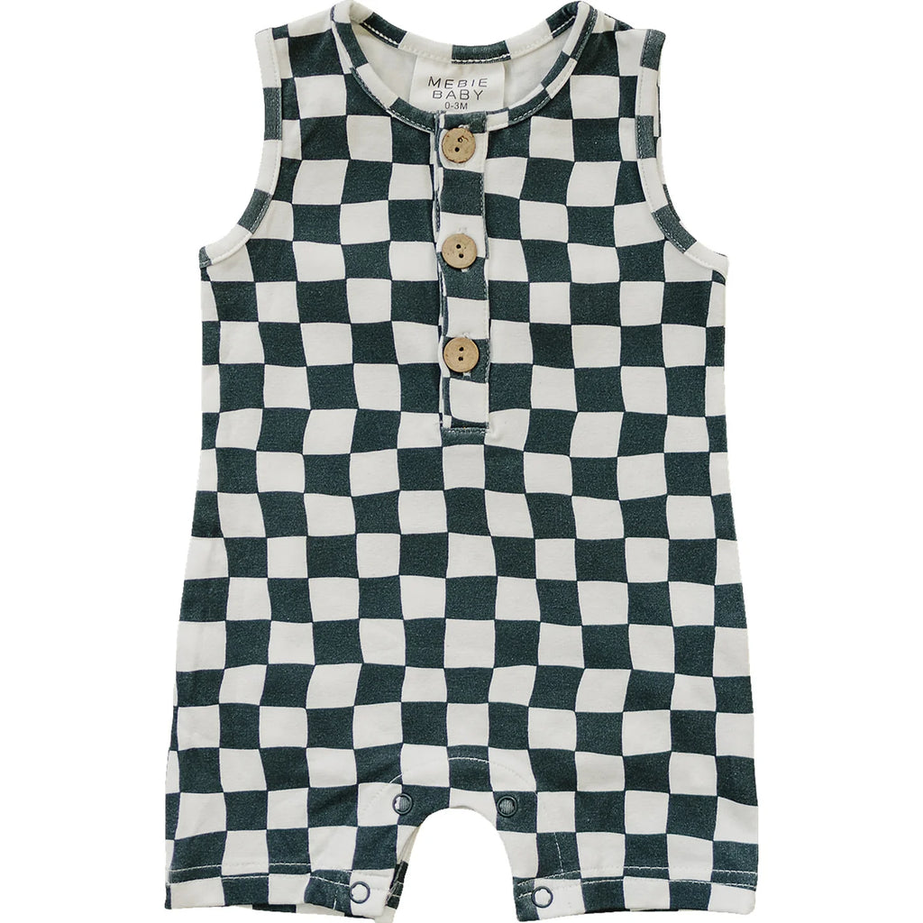 flatlay of checkered short romper on white background 