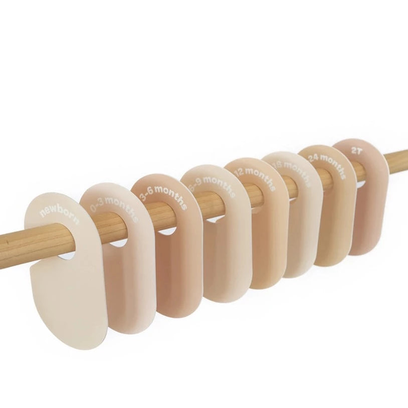 dividers on wooden dowel white background