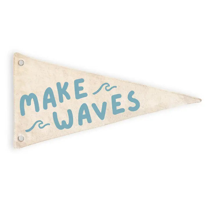 flatlay of make waves pennant sign 