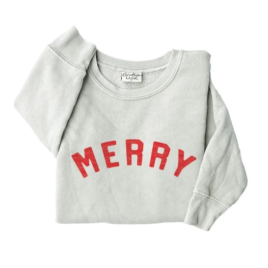 flatlay of merry sweater on white background 