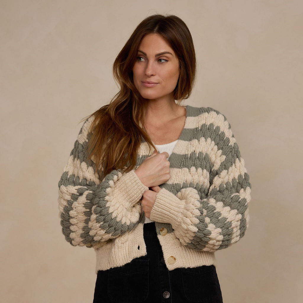 boxy stripe cardigan on women with brown long hair 