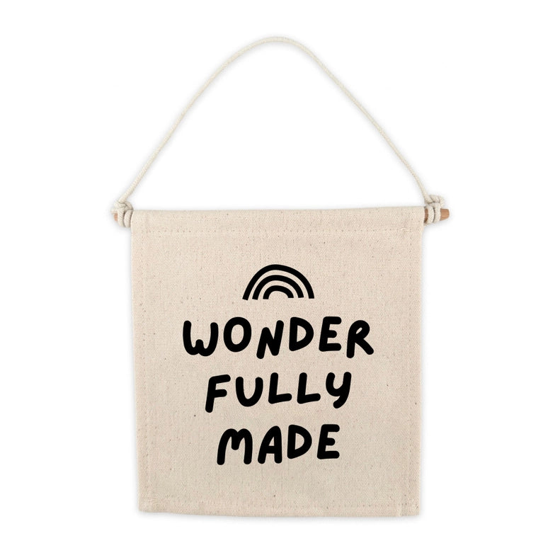 wonderfully made canvas sign on white background 