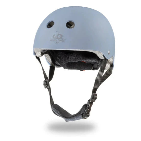 slate blue helmet flatlay on white background 