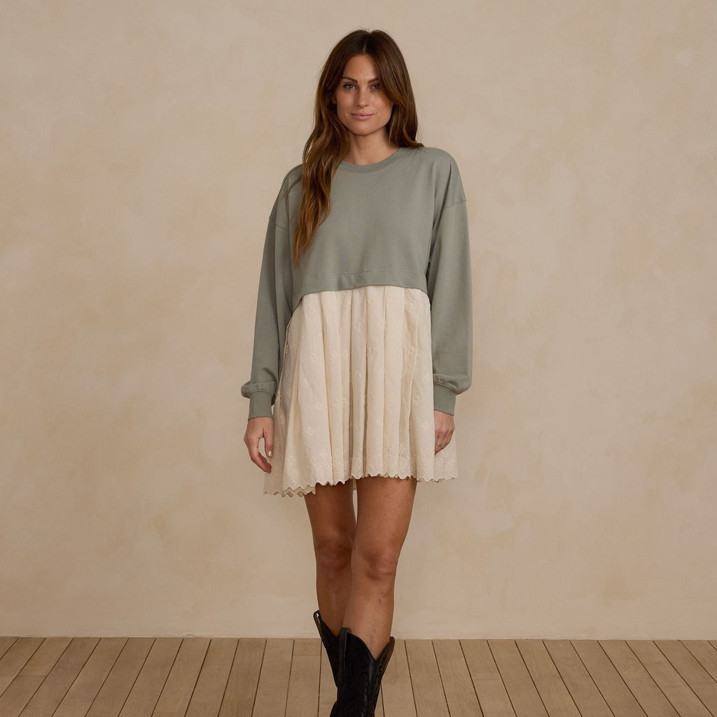 sweatshirt dress on model with black boots 