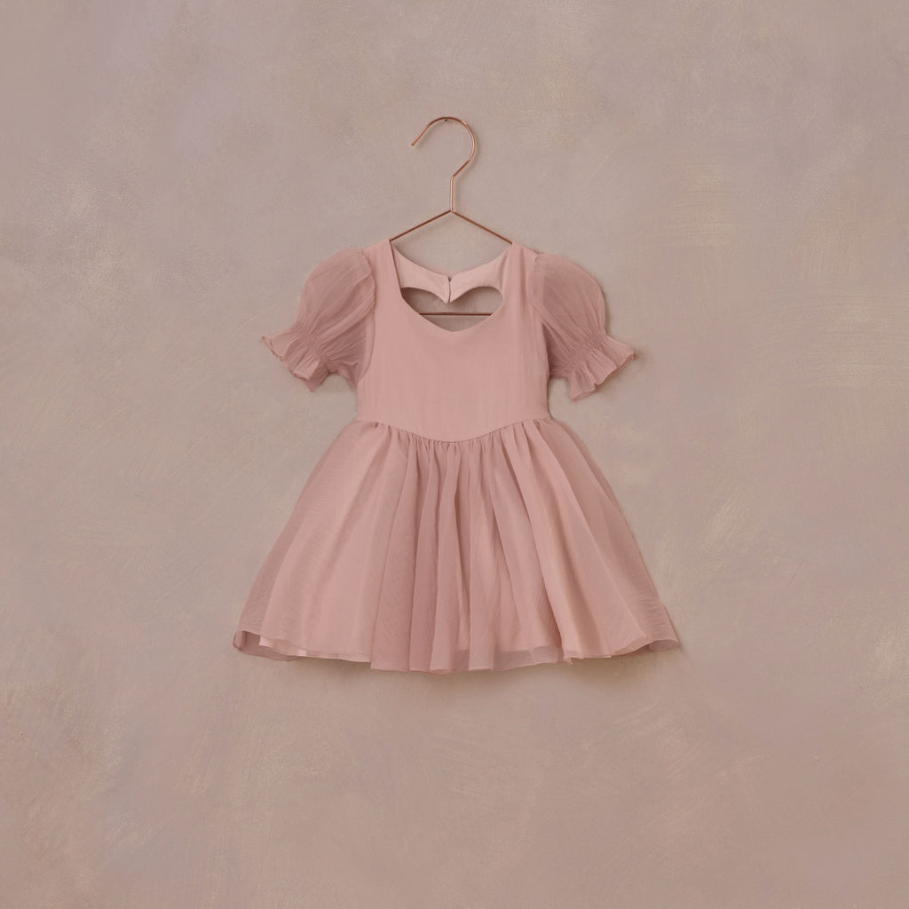 bubblegum dress with heart at the back flatlay 