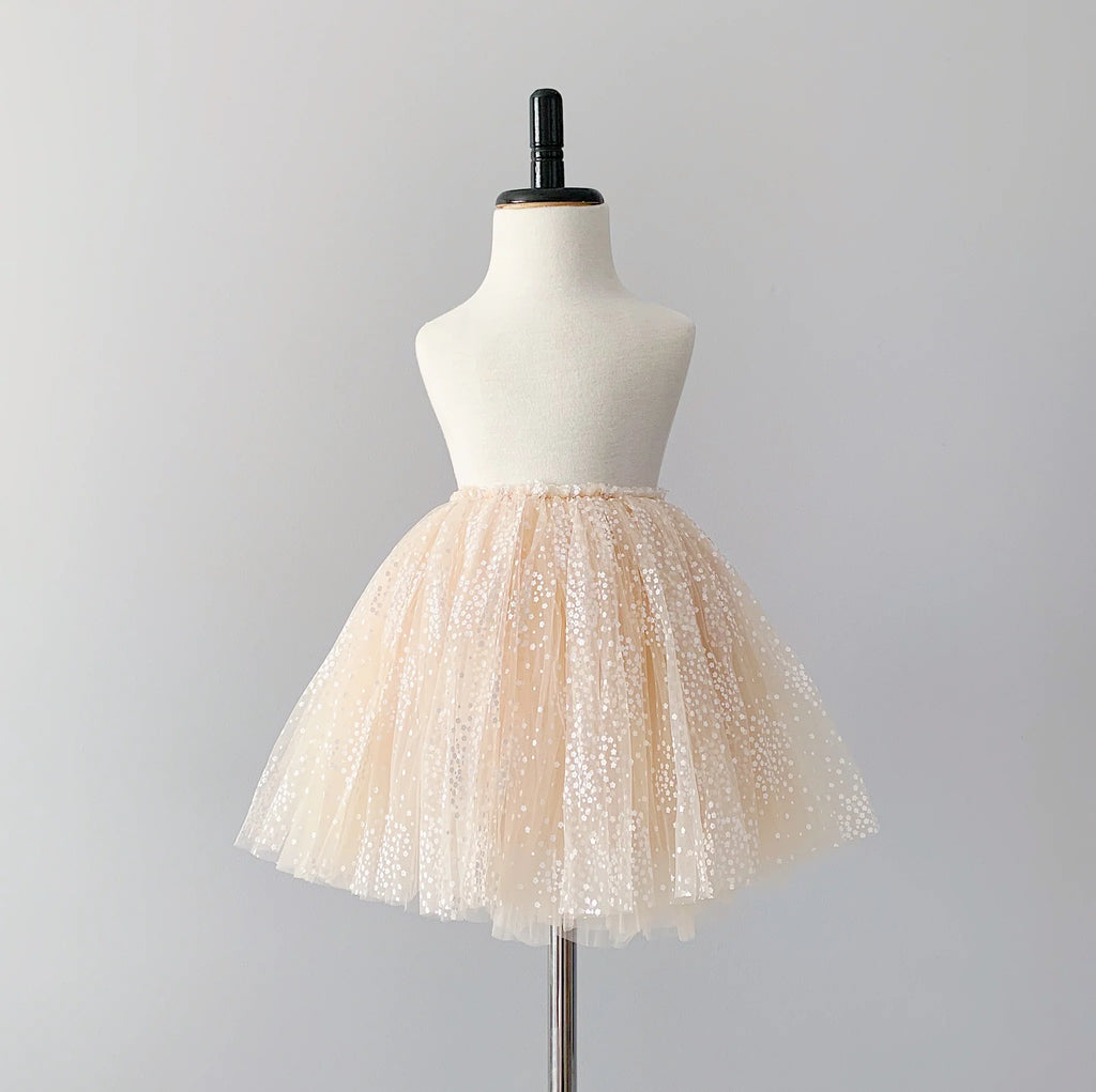 sparkle tutu on mannequin grey background 