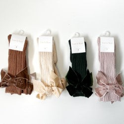 four pairs of socks flat lay