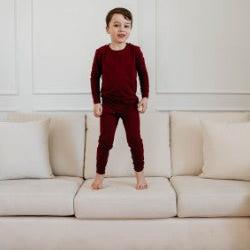 Barberry Two Piece PJ on boy standing on couch