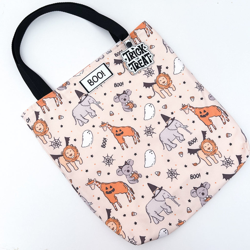 flatlay of zoo halloween bag on white background 