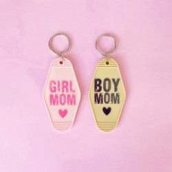 pink & beige keychain on pink background